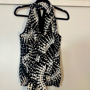 White House Black Market Blouse Fully lined. 100% silk.